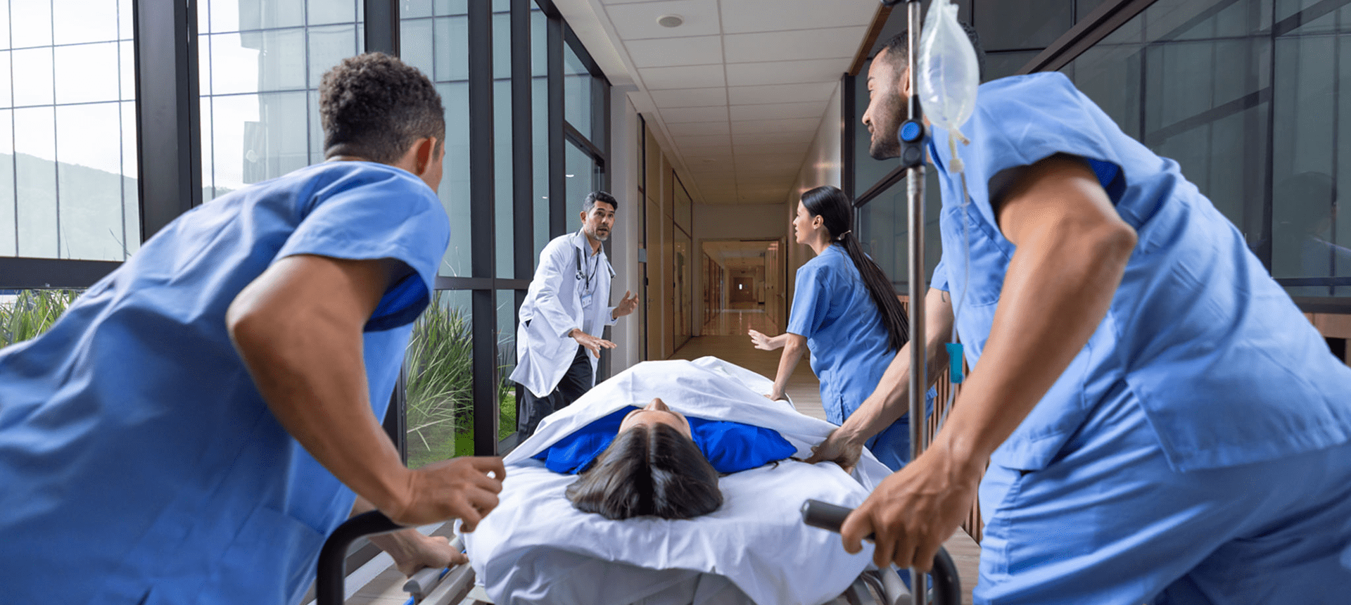 Healthcare professionals in urgent hallway situation