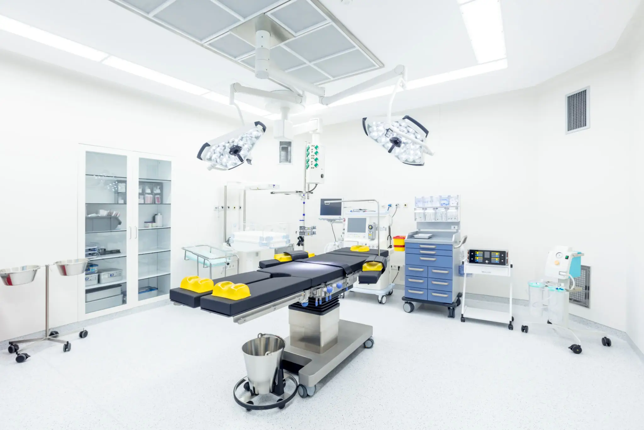 Empty modern operating room with surgical lights